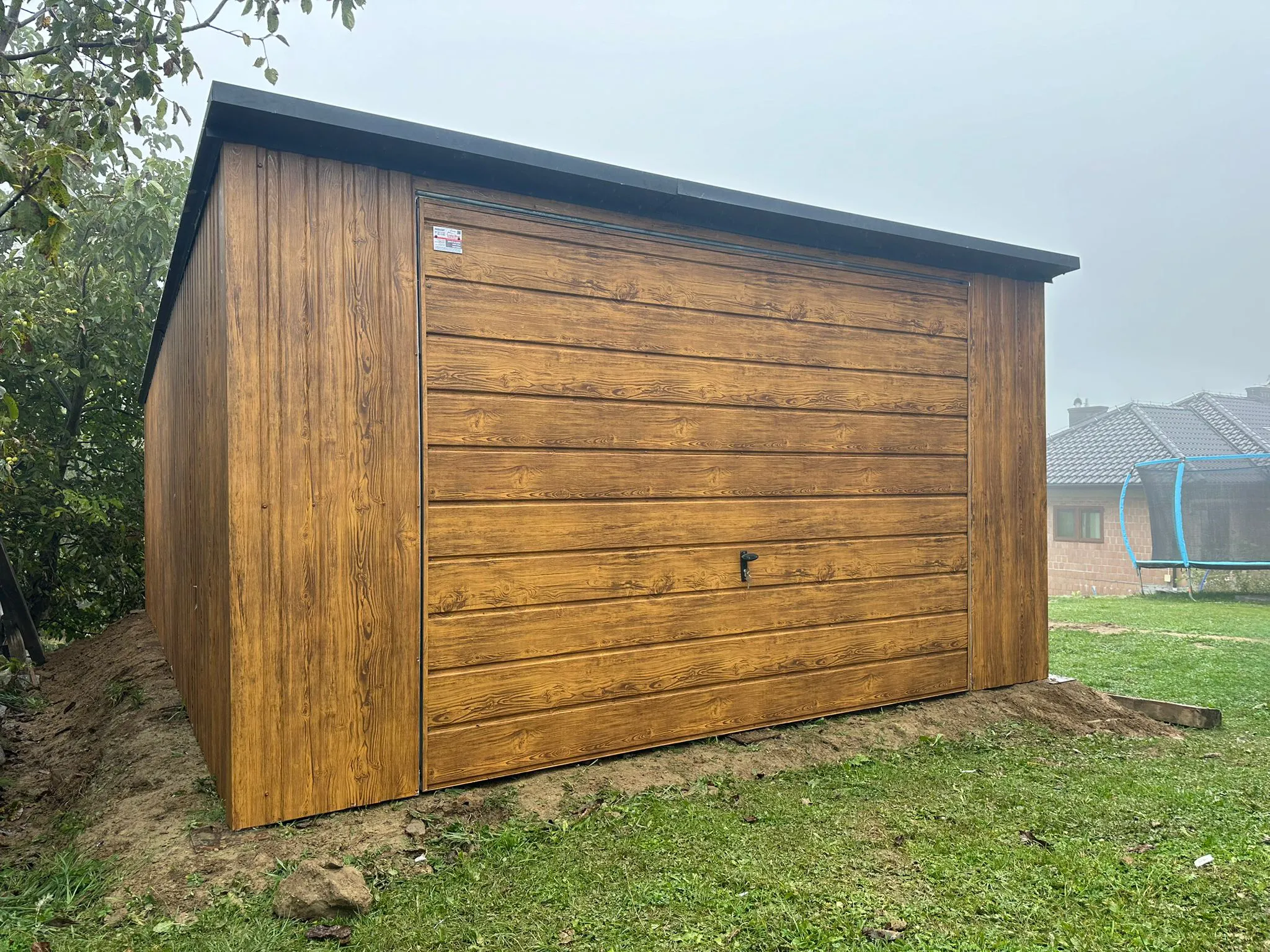 Garage effetto legno nella finitura Rovere Dorato